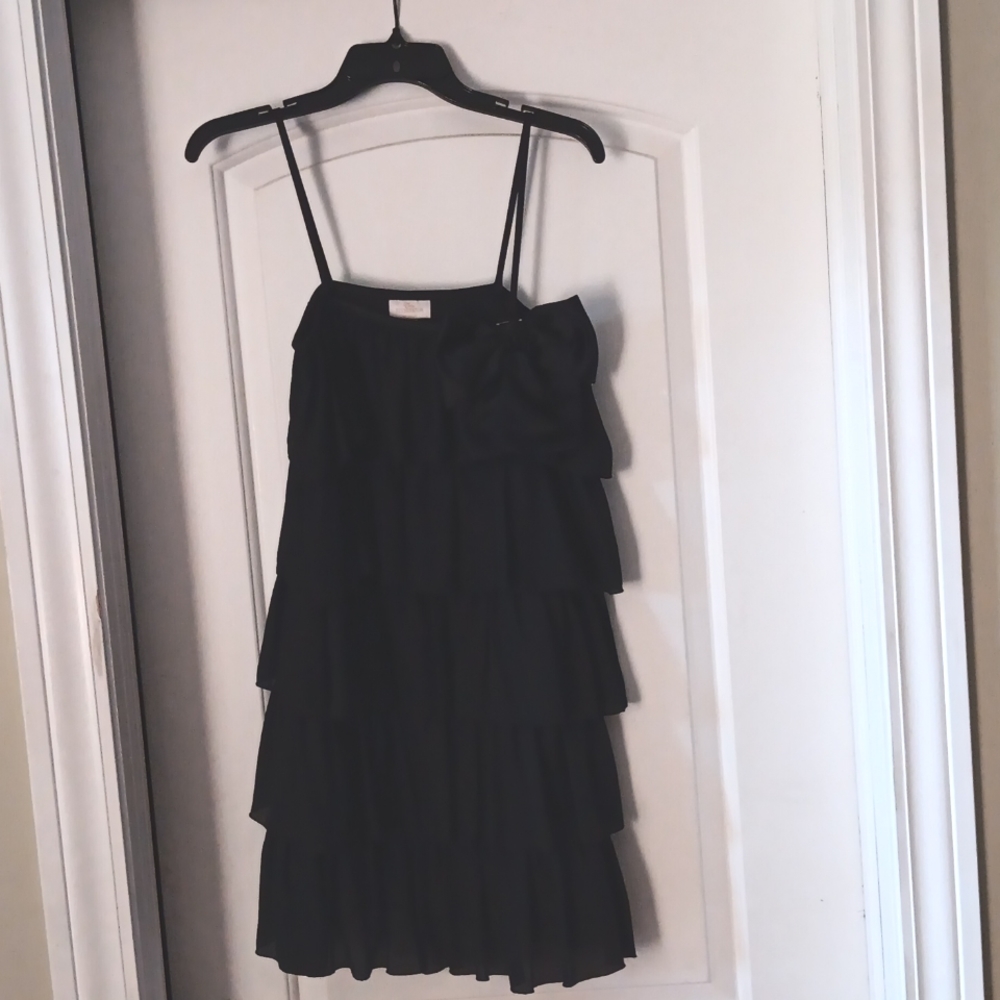Classic black dress with a removable bow